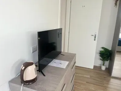 TV o dispositivi per l'intrattenimento presso GIULY SUITES & ROOMS