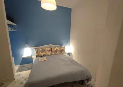 Letto o letti in una camera di A casa di Aurelio - Dimore Partenopee