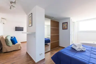 Letto o letti in una camera di Viewsuvio Terrace at historical center by Napoliapartments