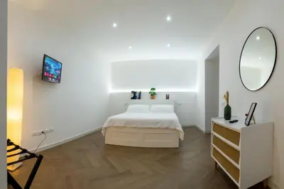 Letto o letti in una camera di CASA TUA MUSEO