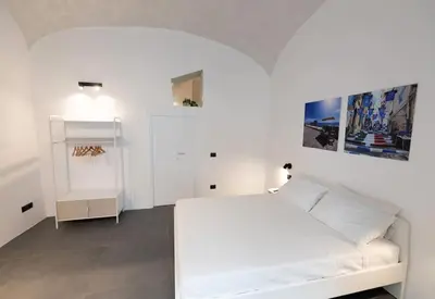 Letto o letti in una camera di Casa Mirelli By Dimorra