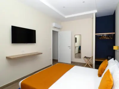 Letto o letti in una camera di Appartamento Salotto Vomero 7