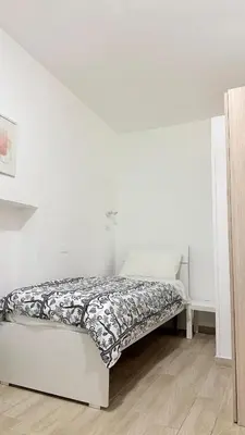Letto o letti in una camera di Ginevra house