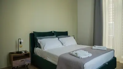 Letto o letti in una camera di Urban Loft Napoli