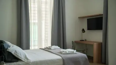 Letto o letti in una camera di Urban Loft Napoli