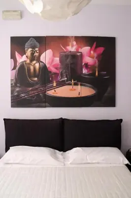 Letto o letti in una camera di Casa Alabardieri