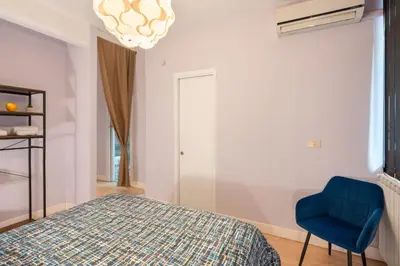Letto o letti in una camera di Casa Alabardieri