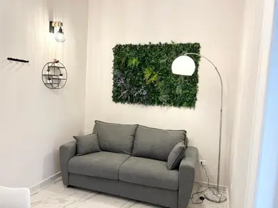 Area soggiorno di Naples Apartment Plebiscito