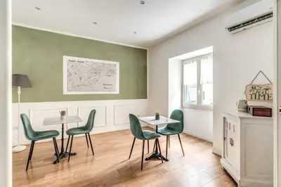 Area soggiorno di Annamaria Rooms