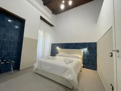 Letto o letti in una camera di La Suite del Centro Storico