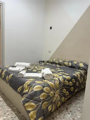 Letto o letti in una camera di Napul’è