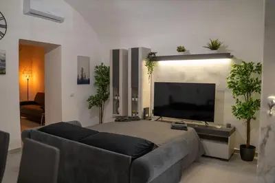 TV o dispositivi per l'intrattenimento presso Dietro al Plebiscito luxury suite