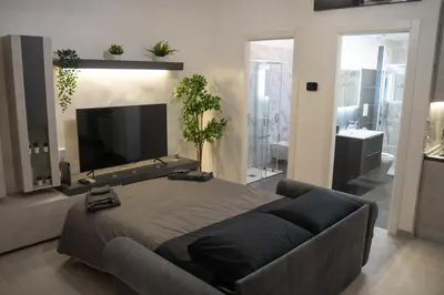 TV o dispositivi per l'intrattenimento presso Dietro al Plebiscito luxury suite