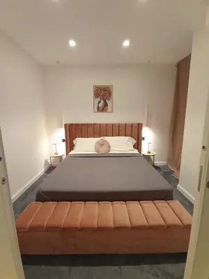 Letto o letti in una camera di Babylon Luxury Suite & Apartments
