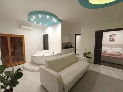Letto o letti in una camera di Babylon Luxury Suite & Apartments