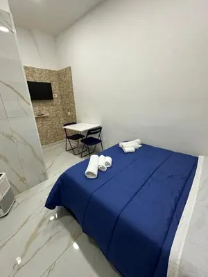 Letto o letti in una camera di Swamy Home