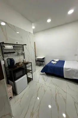 Letto o letti in una camera di Swamy Home