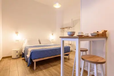 Letto o letti in una camera di EcoSuite Spaccanapoli