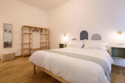 Letto o letti in una camera di EcoSuite Spaccanapoli