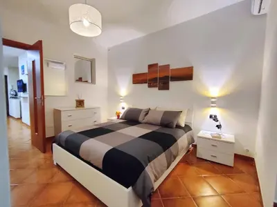Letto o letti in una camera di Chiaia House Vetriera