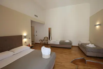 Letto o letti in una camera di Lungomare Suite & Spa