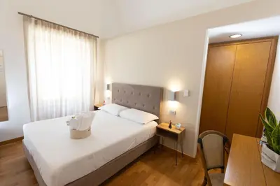 Letto o letti in una camera di Lungomare Suite & Spa