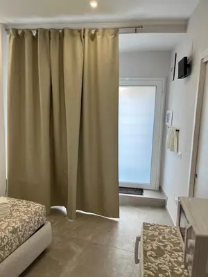 Letto o letti in una camera di Casa paradiso