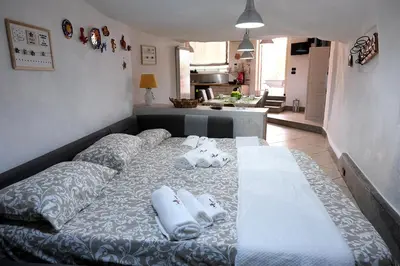Letto o letti in una camera di Casa Confessore