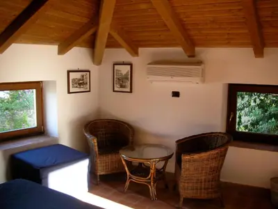 Area soggiorno di Guest House Pedamentina