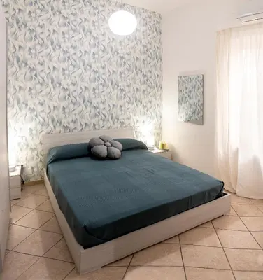 Letto o letti in una camera di Appartamento con Balcone, Porto, Isole, Centro Storico Napoli