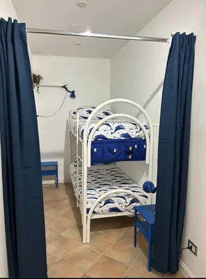 Letto o letti in una camera di Intero Alloggio Salita Tasso