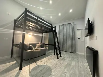 Letto o letti in una camera di Casa Tonia