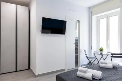 TV o dispositivi per l'intrattenimento presso Partenope Guest House