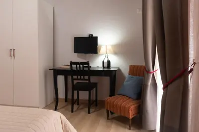 Letto o letti in una camera di Casa Amato_2_Regina Giovanna