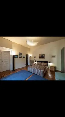 Letto o letti in una camera di Lussuoso appartamento nella Napoli più esclusiva