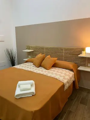 Letto o letti in una camera di Casa Signoria