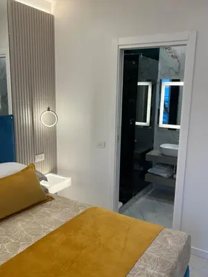 Letto o letti in una camera di La Lepre Artemide