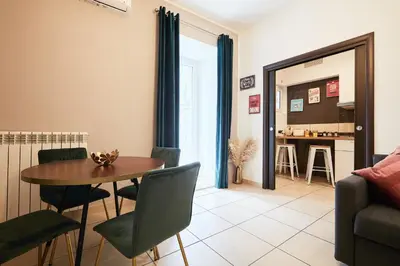 Area soggiorno di Vicky's Luxury Guesthouse by NapoliApartments
