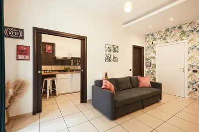 Area soggiorno di Vicky's Luxury Guesthouse by NapoliApartments