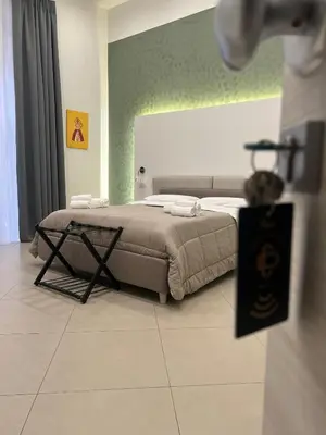 Letto o letti in una camera di Dimora Chiaia