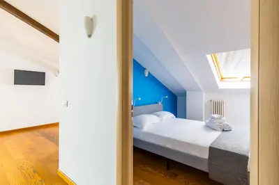 Letto o letti in una camera di Attico al Duomo by Napoliapartments