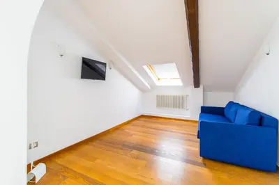 TV o dispositivi per l'intrattenimento presso Attico al Duomo by Napoliapartments