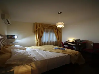 Letto o letti in una camera di Napoli Porta Di Mare