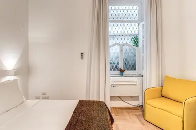 Letto o letti in una camera di La Corte Di Partenope Napoli