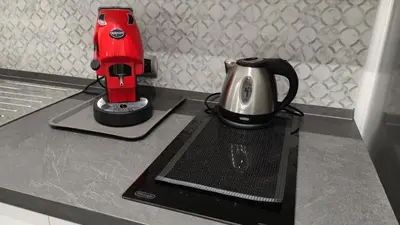 Set per la preparazione di tè e caffè presso Aumm Aumm! Apartment