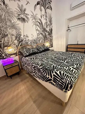 Letto o letti in una camera di EX VOTO