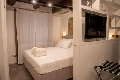 Letto o letti in una camera di Casa Vacanze Maritè Apartment