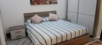 Letto o letti in una camera di LA DIMORA DI TOTÒ