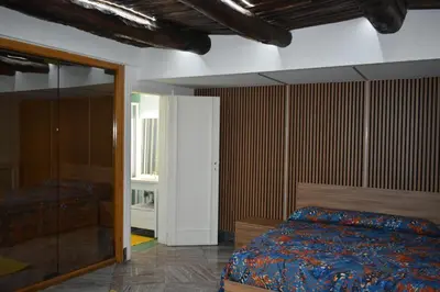 Letto o letti in una camera di LA DIMORA DI TOTÒ