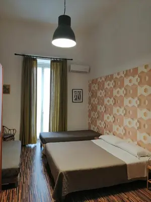 Letto o letti in una camera di Quartieri's House